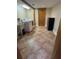 Well-lit laundry room features a washer and dryer, utility sink, and durable tile flooring at 5900 Leeland S St, St Petersburg, FL 33715