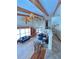 Spacious living room with wooden beams, ceiling fans and comfortable furnishings at 5900 Leeland S St, St Petersburg, FL 33715