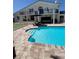 Beautiful pool and putting green area with lounge seating, perfect for relaxation and entertainment at 5900 Leeland S St, St Petersburg, FL 33715