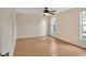 Spacious bedroom with laminate flooring and ceiling fan at 909 Kirkcaldy Way, Valrico, FL 33594