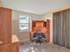 Cozy bedroom with built in desk and large window at 909 Kirkcaldy Way, Valrico, FL 33594