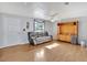 Inviting living room with lots of light and updated stylish flooring throughout at 909 Kirkcaldy Way, Valrico, FL 33594
