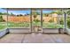 Relaxing screened patio showcases a fenced backyard with ample lawn space at 909 Kirkcaldy Way, Valrico, FL 33594