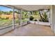 Enclosed back porch area features a private fenced yard at 909 Kirkcaldy Way, Valrico, FL 33594