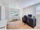 Bright office space featuring hardwood floors, a large desk, and natural light at 1121 49Th Ave N, St Petersburg, FL 33703