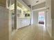Bathroom featuring double sinks, shower, and tile flooring at 2317 Valrico Forest Dr, Valrico, FL 33594