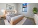 Serene bedroom boasts a plush rug, a comfy bed, and a view from the bright window at 2317 Valrico Forest Dr, Valrico, FL 33594