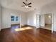 Bright living room with hardwood floors, recessed lights, and french doors to an adjoining room at 2317 Valrico Forest Dr, Valrico, FL 33594