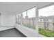 Enclosed porch area with lots of windows to view backyard space at 2353 Shelley St # 8, Clearwater, FL 33765