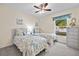 Inviting bedroom with twin beds, coordinated linens, and a serene atmosphere for restful nights at 3699 N Chamberlain Blvd, North Port, FL 34286