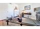 Office space with Pilates machine, desk, storage, and white walls at 11826 Sky Acres Ter, Bradenton, FL 34211