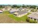 Picturesque neighborhood with well-maintained homes, lawns, and mature trees at 13202 Golf Ridge Pl, Hudson, FL 34669
