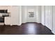 Bright dining area with tile floors, a window with a cozy nook, and easy access to the kitchen at 13202 Golf Ridge Pl, Hudson, FL 34669