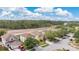 Scenic neighborhood aerial displaying homes near wooded areas, highlighting its convenient access to nature and serene suburban atmosphere at 19648 Timberbluff Dr, Land O Lakes, FL 34638