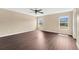 Spacious bedroom has dual windows to let in natural light at 19648 Timberbluff Dr, Land O Lakes, FL 34638
