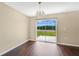 Cozy dining space featuring a sliding glass door leading to the backyard at 19648 Timberbluff Dr, Land O Lakes, FL 34638