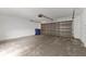 Spacious two-car garage with an automatic door opener and ample room for parking and storage at 19648 Timberbluff Dr, Land O Lakes, FL 34638