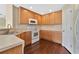 Well-maintained kitchen with plentiful cabinets, stainless steel sink, and modern appliances at 19648 Timberbluff Dr, Land O Lakes, FL 34638