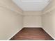 Large walk-in closet with hanging storage at 19648 Timberbluff Dr, Land O Lakes, FL 34638