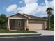 Charming single-story home showcasing a two-car garage, landscaped yard, and neutral color palette under a sunny sky at 14699 Italy Ave, Dade City, FL 33523