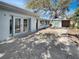 Outdoor patio area featuring double doors and storage shed at 2826 46Th S St, Gulfport, FL 33711