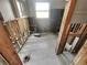 Kitchen ready for renovation, featuring concrete flooring and window at 2826 46Th S St, Gulfport, FL 33711