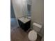 Bathroom showcasing a vanity with granite countertop and modern fixtures at 27118 Fernery Ave, Brooksville, FL 34602