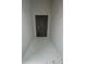 Entryway showcasing a modern front door and neutral paint at 27118 Fernery Ave, Brooksville, FL 34602