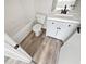 Clean bathroom featuring white fixtures and vanity with modern sink at 6122 Osprey Lake Cir, Riverview, FL 33578