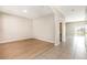 Bright, airy living room featuring modern flooring and neutral wall color at 11807 Myrtle Rock Dr, Riverview, FL 33578
