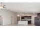 Open-concept living and kitchen area, featuring recessed lighting and neutral paint at 13581 Willow Bluestar Loop, Riverview, FL 33579
