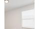 Neutral bedroom with a large window offering natural light, enhancing the room's airy and welcoming atmosphere at 13417 Lake Monroe Pl, Riverview, FL 33579