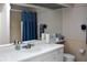 Bright bathroom featuring vanity, a large mirror and a shower at 26187 Argentina Dr, Punta Gorda, FL 33983
