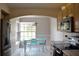 Eat in kitchen area with stainless steel appliances and large window at 26187 Argentina Dr, Punta Gorda, FL 33983