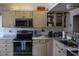 Well-equipped kitchen with stainless steel appliances and granite countertops at 26187 Argentina Dr, Punta Gorda, FL 33983