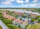Elevated view of townhouses, illustrating the community's design by the lake at 10520 Windsor Lake Ct # 10520, Tampa, FL 33626