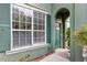 Multi-Gathering home featuring manicured landscaping, sidewalks, and an arched entry at 10520 Windsor Lake Ct # 10520, Tampa, FL 33626