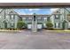 Inviting condominium with pleasing curb appeal, tidy landscaping, and attached garage at 10520 Windsor Lake Ct # 10520, Tampa, FL 33626