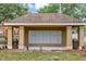 Community mailboxes in a covered area with landscaping, providing convenience and security at 10520 Windsor Lake Ct # 10520, Tampa, FL 33626