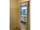 Bright bathroom boasts a white vanity with marble countertop and a stylish light fixture at 1210 Etchfield Cir, Brandon, FL 33511