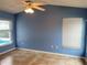 Relaxing bedroom with high ceilings, tile flooring, and multiple windows for bright, natural light at 1210 Etchfield Cir, Brandon, FL 33511