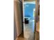 Bedroom with tiled floor, closet, and a ceiling fan, accessible through an open door at 1210 Etchfield Cir, Brandon, FL 33511