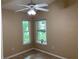 Bedroom with lots of natural light, tile flooring and ceiling fan at 1210 Etchfield Cir, Brandon, FL 33511