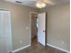 Bedroom with view through an open door and closet at 1210 Etchfield Cir, Brandon, FL 33511