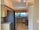Bright kitchen featuring stainless steel appliances, ample counter space, and tile flooring at 1210 Etchfield Cir, Brandon, FL 33511