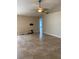 Spacious living room with tile flooring, neutral walls and ceiling fan, great for entertaining at 1210 Etchfield Cir, Brandon, FL 33511