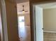 Bright living room with tile floors, view of the pool, and access to other rooms in the home at 1210 Etchfield Cir, Brandon, FL 33511