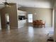 Spacious living room area with an open layout and tile flooring is perfect for entertaining at 1210 Etchfield Cir, Brandon, FL 33511