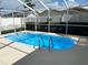 Refreshing outdoor pool and deck area, perfect for enjoying sunny days and relaxation at 1210 Etchfield Cir, Brandon, FL 33511
