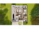 Expansive home floor plan featuring multiple bedrooms, an open-concept living area, and a large garage at 25197 Delgado Dr, Punta Gorda, FL 33955